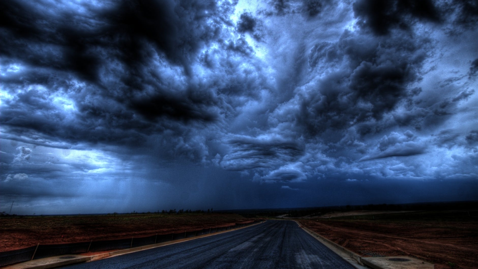 road under cloudy sky